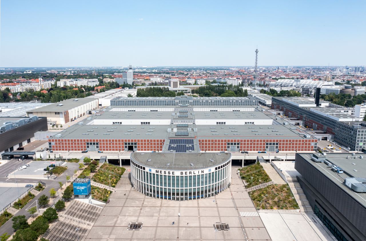Aerial view of the Messe Berlin exhibition halls, the IFA trade show venue, with the Funkturm radio tower in the background